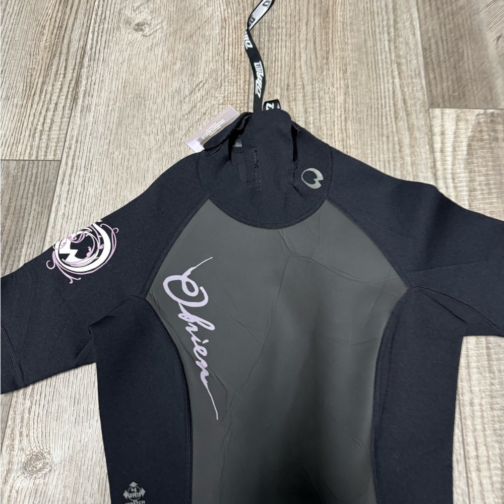 New NWT O’Brien Shorty black purple wetsuit short sleeve Med neoprene - Picture 4 of 7